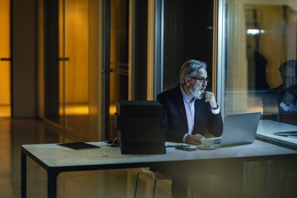 istock Businessman Working Late in The Office 1125984904