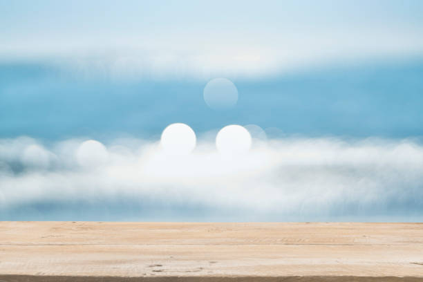 istock Empty Wooden Planks with Blur Beach on Background 1125987133