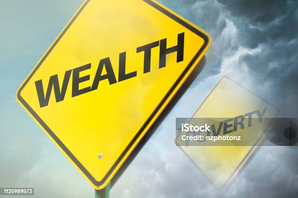 Wealth Or Poverty Warning Sign Concept Stock Photo - Download Image Now