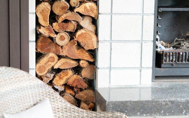 istock Outdoor fireplace setting at modern holiday home 1125992640