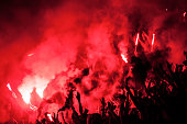 Football fans lit up the lights, flares and smoke bombs