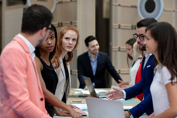 istock young business people working on a new project 1126006771