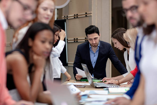 istock young business people working on a new project 1126006826