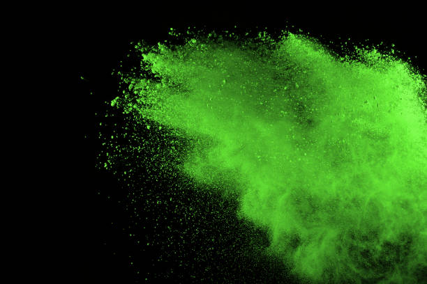 istock Green powder explosion on black background. Colored cloud. Colorful dust explode. Paint Holi. 1126016107