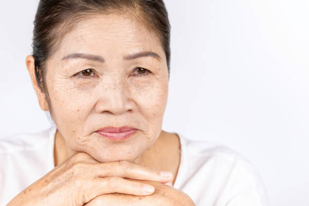 istock Old asian woman 60-70 years old thinking with copy space 1126016836