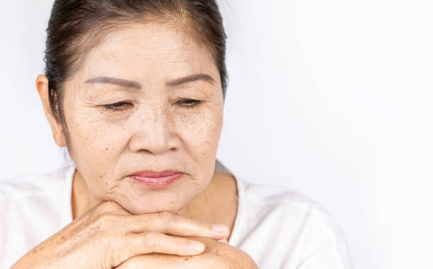 istock Old asian woman 60-70 years old thinking with copy space 1126016858