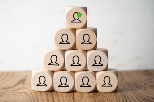 istock many people together having an idea symbolized by icons on cubes 1126016919