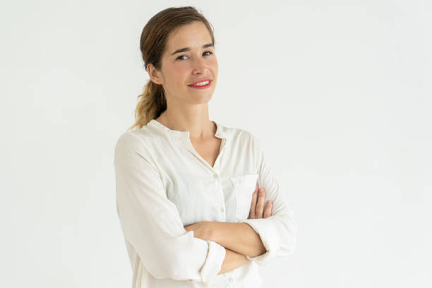 istock Smiling pretty young woman posing at camera 1126022197