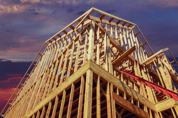 istock New residential construction house framing against a sunset 1126022470
