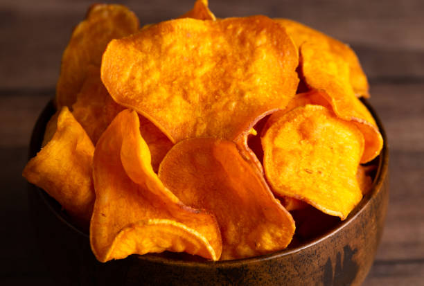 istock Healthy Potato Chips Made with Sweet Potatoes an Alternative to Classic Chips 1126023329