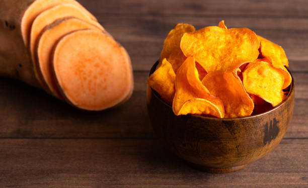 istock Healthy Potato Chips Made with Sweet Potatoes an Alternative to Classic Chips 1126023940