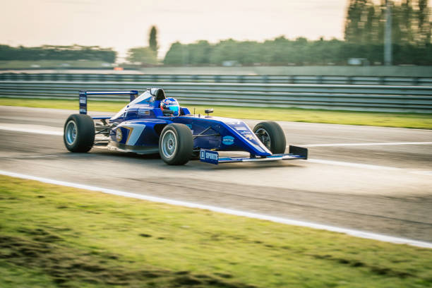 istock Formula race car going fast on the track 1126024199