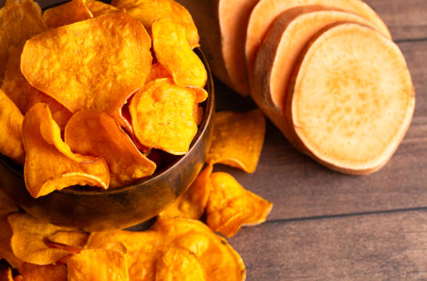 istock Healthy Potato Chips Made with Sweet Potatoes an Alternative to Classic Chips 1126024292