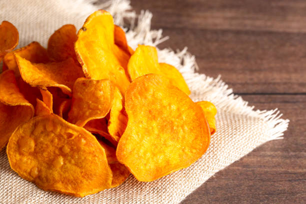 istock Healthy Potato Chips Made with Sweet Potatoes an Alternative to Classic Chips 1126024294