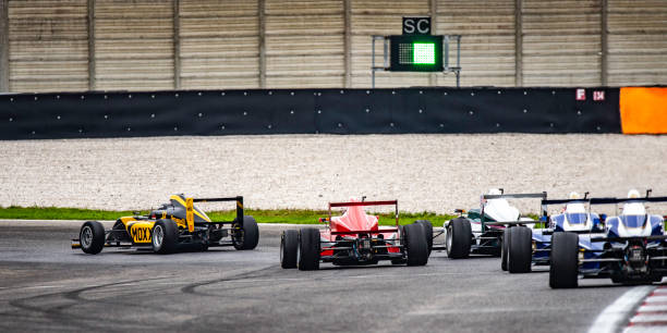 istock Formula race cars on a race track 1126025338