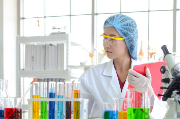 istock Woman scientist doing experiment in laboratory. 1126033387