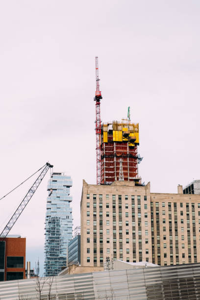 istock Building under construction with top crane in Manhattan - New York - USA 1126034236