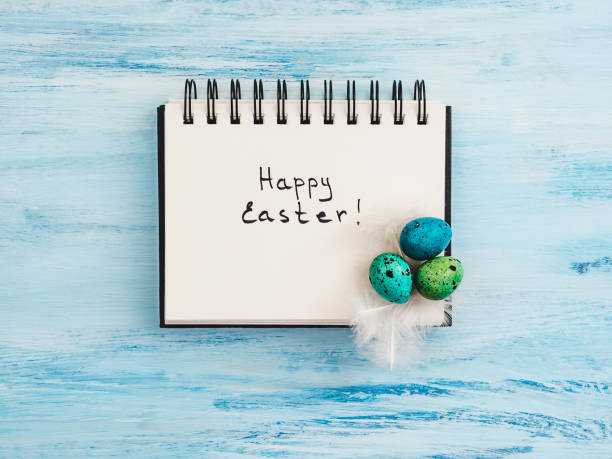 istock Easter eggs painted in bright colors on a blue background 1126035306