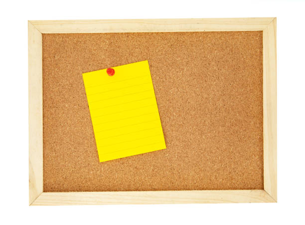 istock pin a note paper on a cork pin board  , isolated on white 1126038345