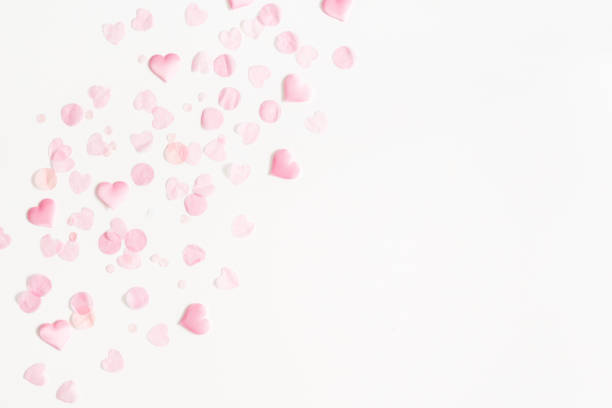 istock Valentine's Day background. Pink hearts on white background. Valentines day concept. Flat lay, top view, copy space 1126038691