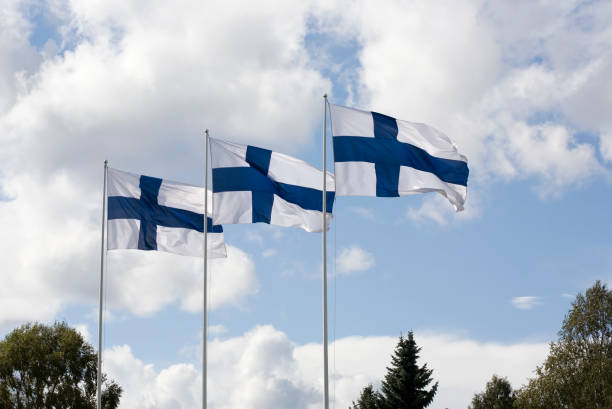 istock 3 flags of Finland 1126045172