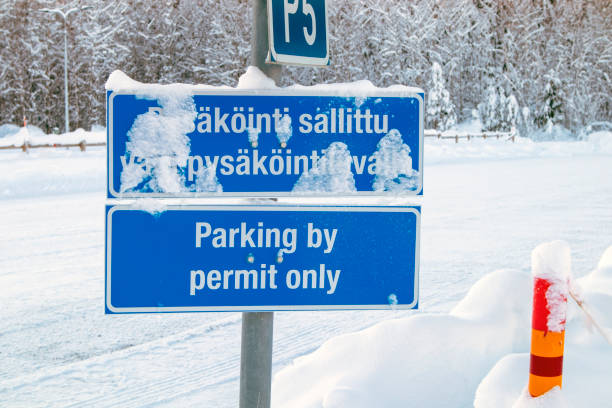 istock parking lot signs at winter, Finland 1126047356