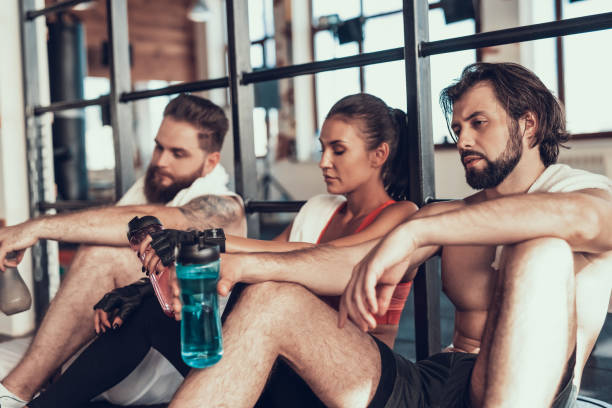 istock Two Guys And Girl Are Resting On Horizontal Bars. 1126048770