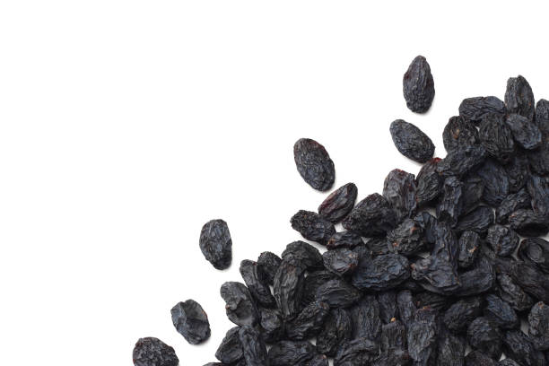 istock black raisins isolated on white background. top view 1126055633