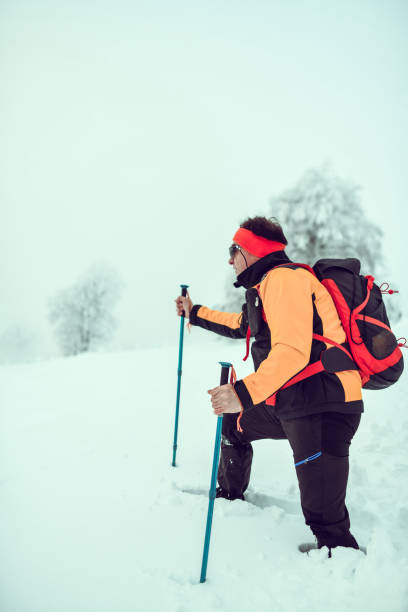 istock Senior Alpinist Posing On The Move 1126055719