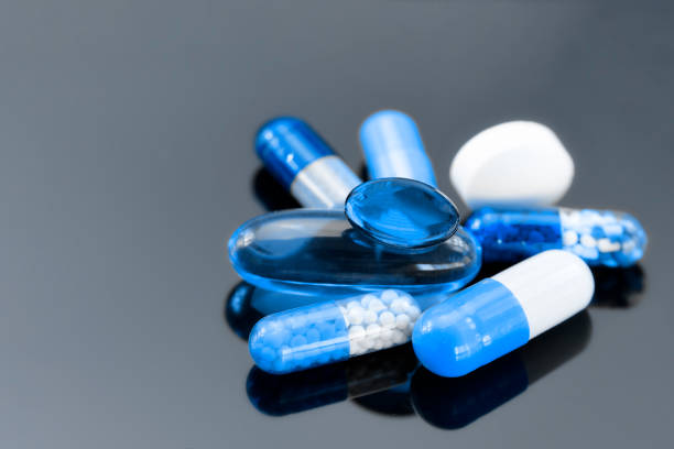 istock Oral medications on dark background. 1126056979