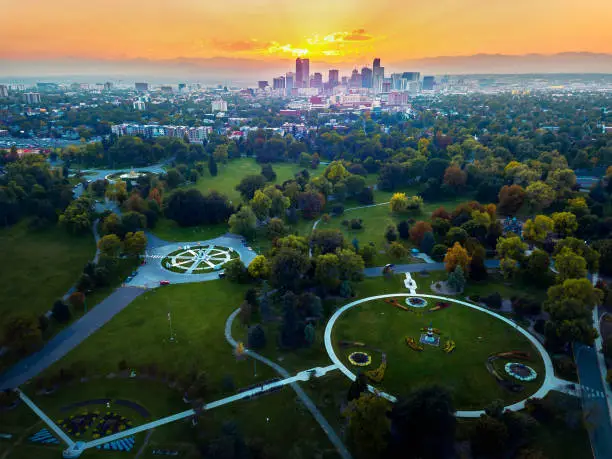 Aerial photo of Denver skyline at sunset taken from a park