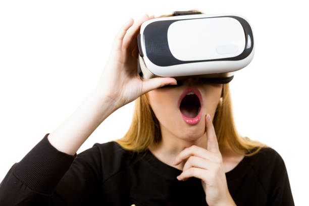 istock Woman wearing VR goggles 1126061910