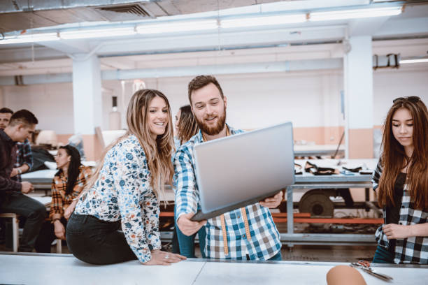 istock Factory Owner Satisfied From Her New Male Designer 1126063012