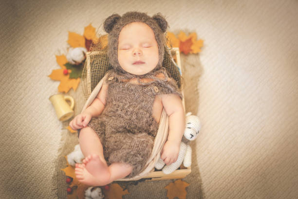 istock Newborn baby boy in a bear costume 1126064462