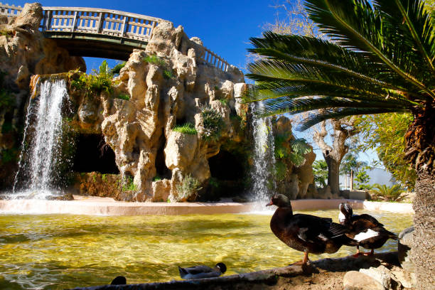 Small fountain/waterfall n the public Genoves Park, Cadiz, Spain