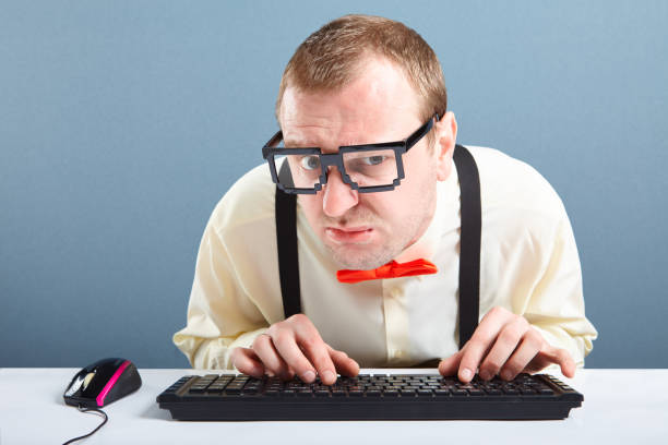 Nerd Guy Typing On Computer Keyboard Stock Photo - Download Image Now - Nerd, Typing, Eyeglasses - iStock Nerd Guy Typing On Computer Keyboard Stock Photo - Download Image Now - Nerd, Typing, Eyeglasses - iStock