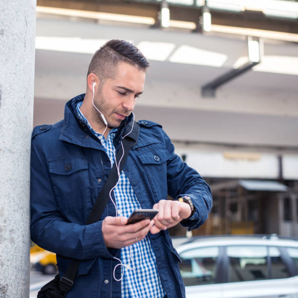 istock Businessman using a phone in city 1126072258