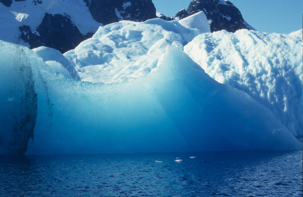 istock The deep blue ice of a old iceberg 1126072563