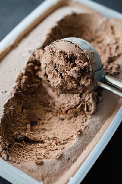 istock Scoop with delicious chocolate ice cream ball 1126074431