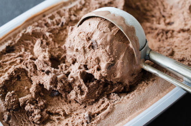 istock Scoop with delicious chocolate ice cream ball 1126074452