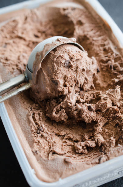 istock Scoop with delicious chocolate ice cream ball 1126074553