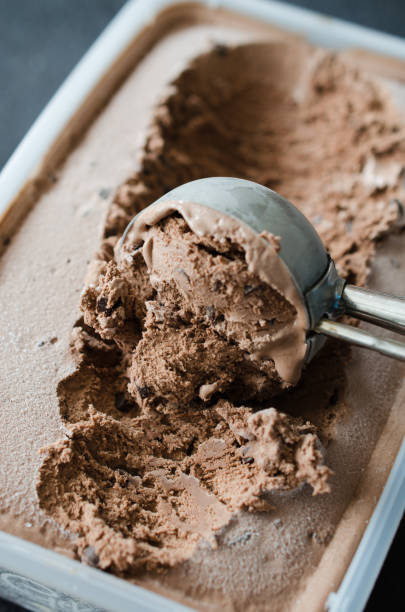 istock Scoop with delicious chocolate ice cream ball 1126074563