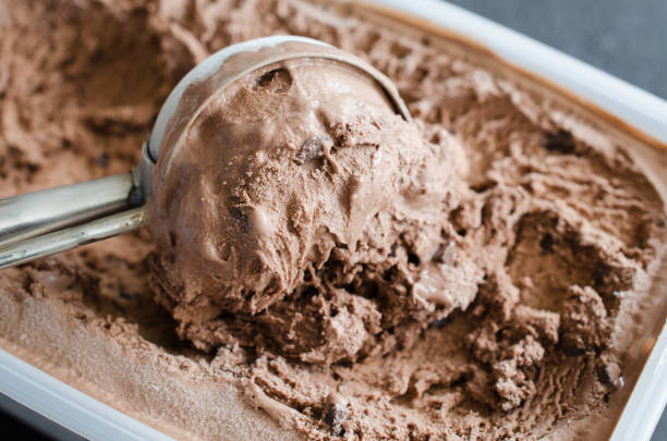 istock Scoop with delicious chocolate ice cream ball 1126074564