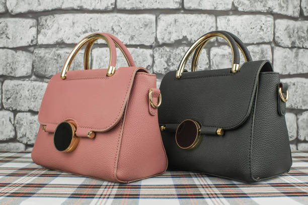 istock Black and pink fashionable bags left 1126076166