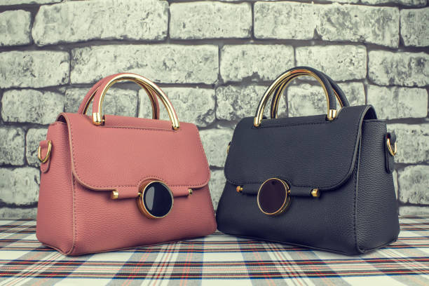 istock Pink and black fashionable bags 1126076235