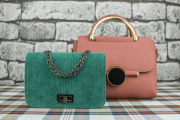 istock Pink bag and green clutch 1126076246