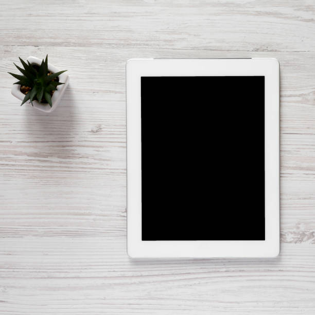 istock Tablet with blank screen, overhead view. Top view, from above, flat lay. 1126076471