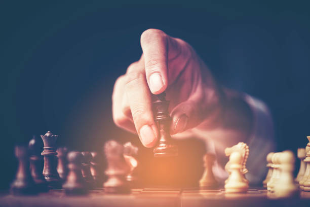 istock business success concept with chess, vintage filter image background 1126078360