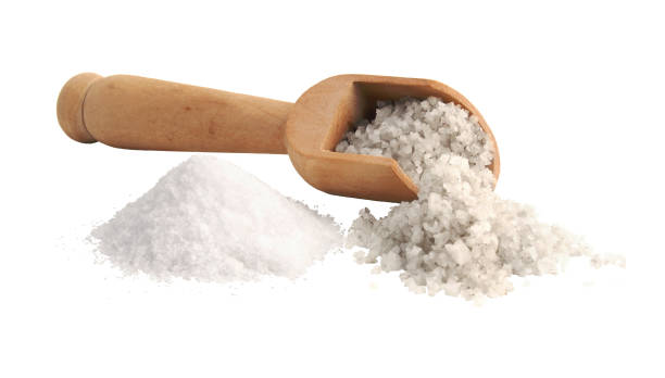 istock Coarse salt and refined salt, isolated on white background. 1126078461