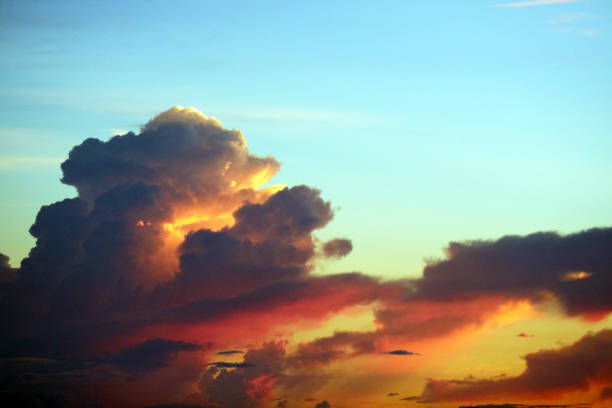 istock sunset on sea and colorful flame cloud cold sky 1126079947